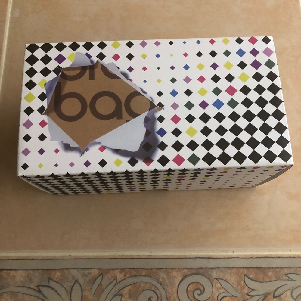 Bloomingdale’s multi colored candle holders
